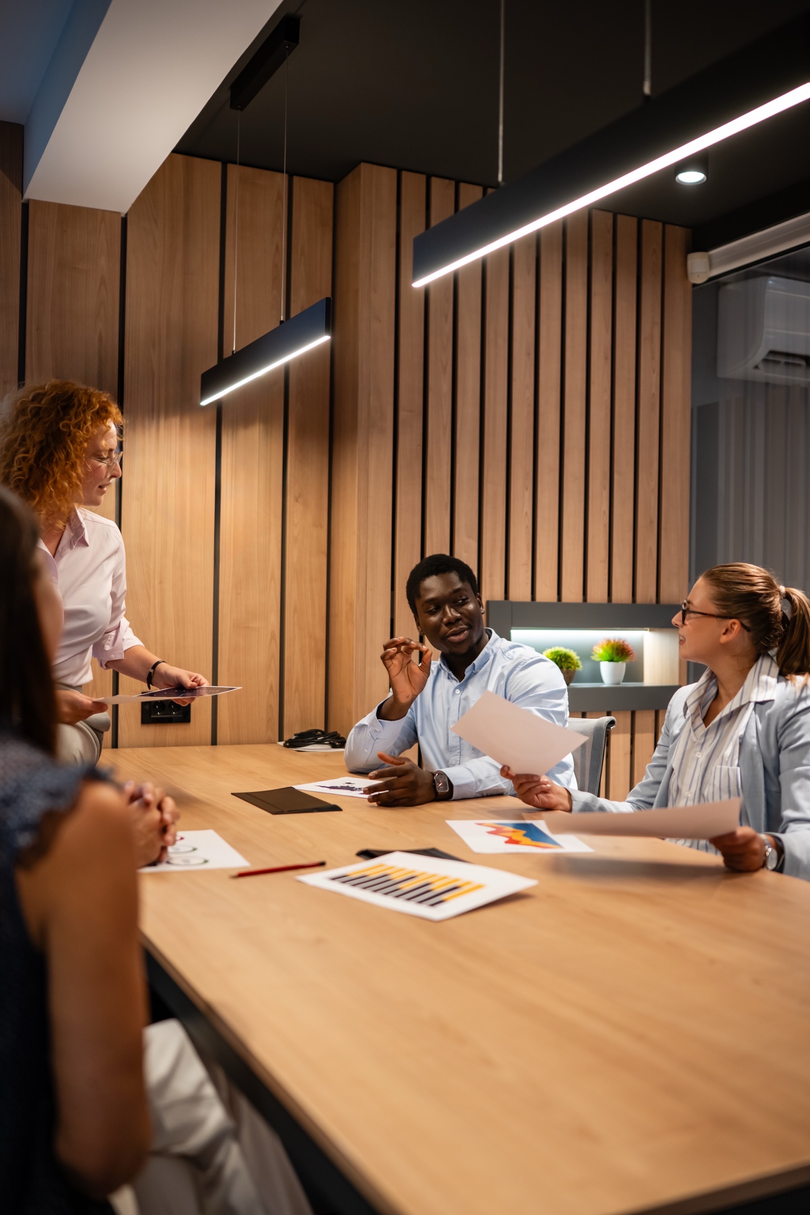 A diverse business team collaborating during a creative session