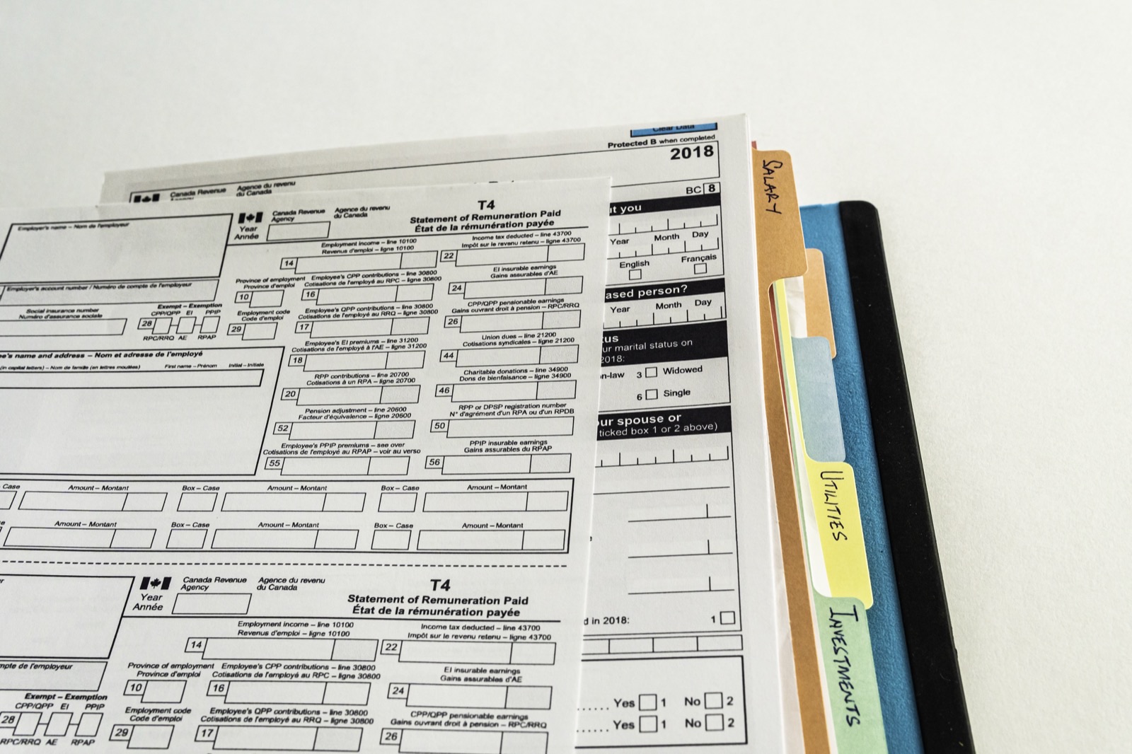 File binders with documents prepared for Canadian taxes