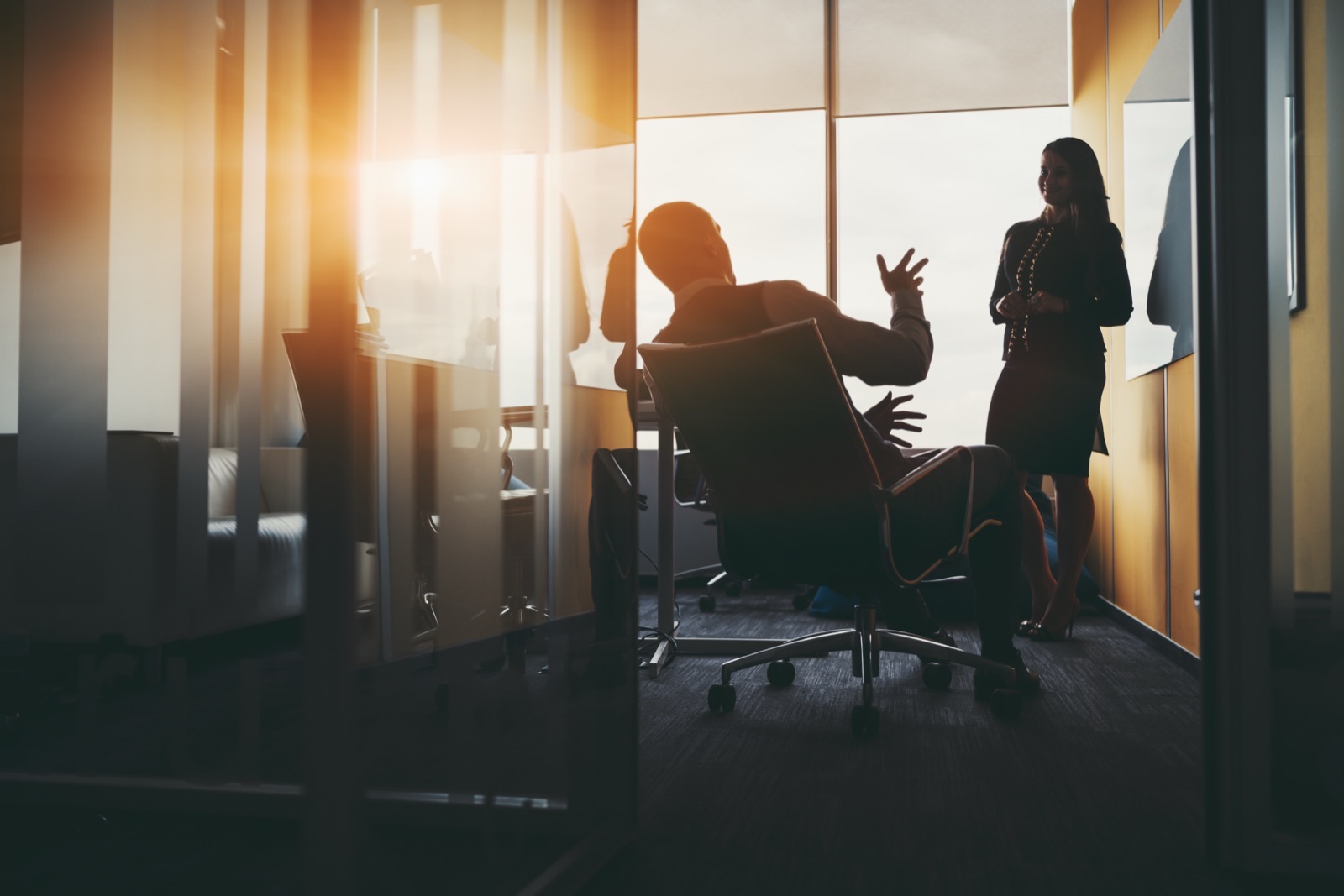A meeting in an office boardroom